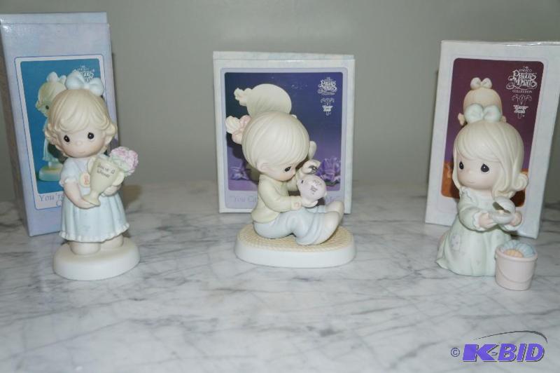 lot 83 image: Lot of 3 Easter Seals Special Edition Precious Moments Figurines