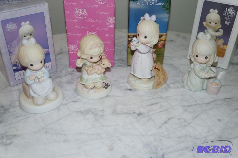 lot 84 image: Lot of 4 Easter Seals Limited Edition Precious Moments Figurines