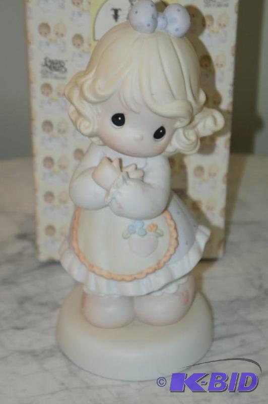 lot 86 image: Love is Universal Limited Edition to 2000 Precious Moments Figurine