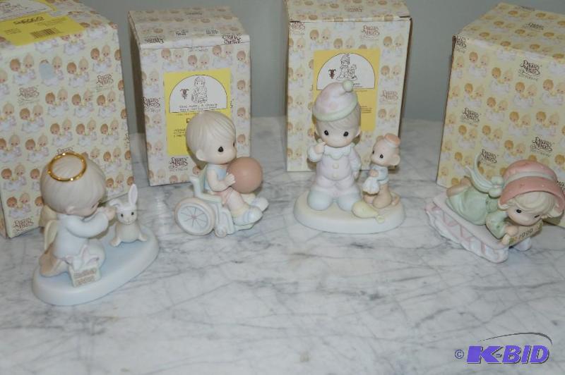lot 87 image: Lot of 4 SpecialAnnualEaster Seals Editions Precious Moments Figurines