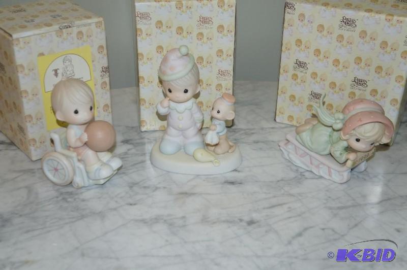 lot 88 image: Lot of 3 SpecialAnnualEaster Seals Precious Moments Figurines