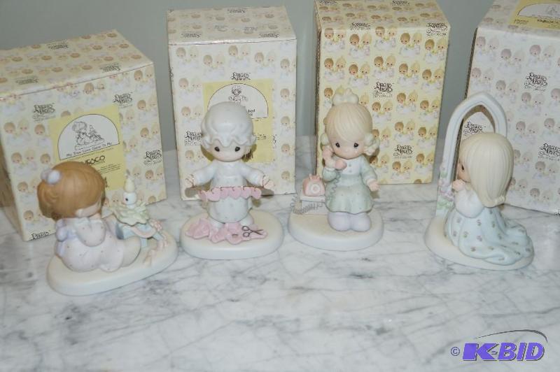 lot 93 image: Lot of 4 Precious Moments Figurines