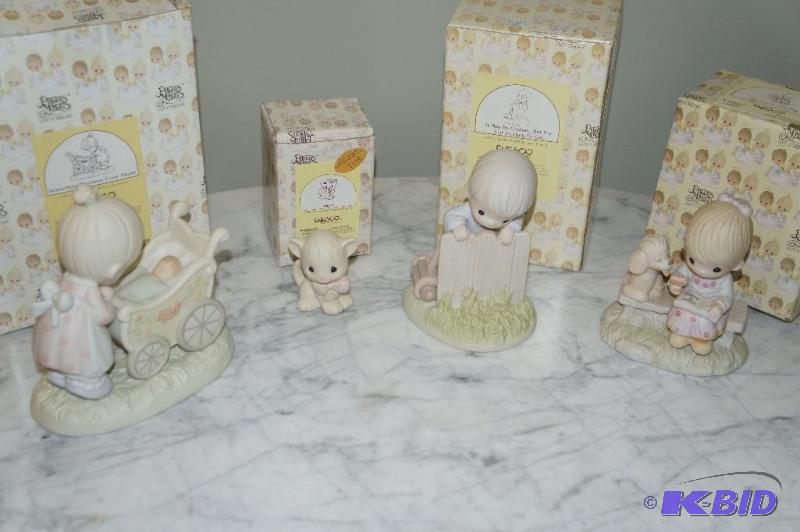 lot 96 image: Lot of 4 Precious Moments Figurines