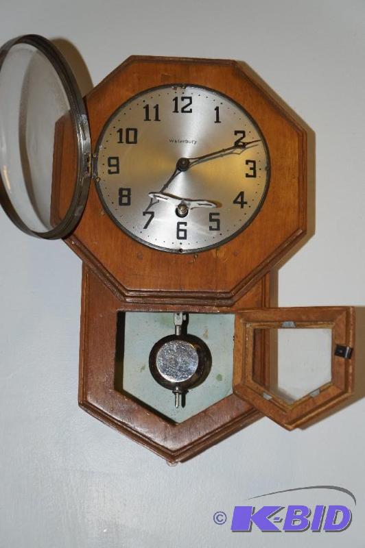 lot 173 image: Vintage 1930 Waterbury Wind Up Pendulum with Key Grandmother Clock