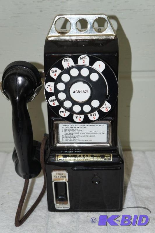 lot 215 image: Sealed Kentucky Beam 3 Coin Slot Dial Pay Phone Decanter, Fifth in a Series of Telephone Decanters