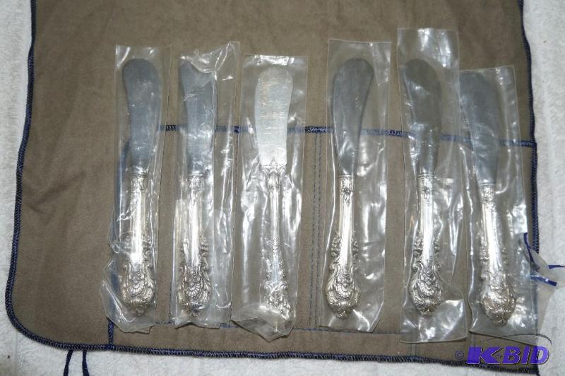 lot 223 image: Lot of 6 Silver Butter Knives - All But One Package Unopened