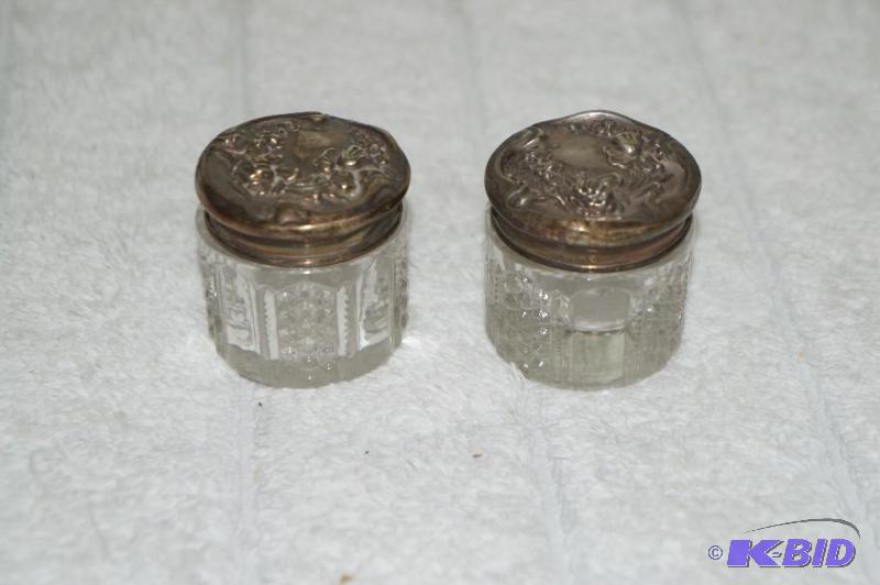 lot 239 image: Set of 2 Silver Topped Lid Bottles