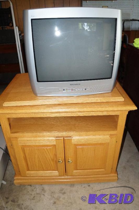 lot 355 image: Wood TV Stand with Swivel Top with Magnavox TV