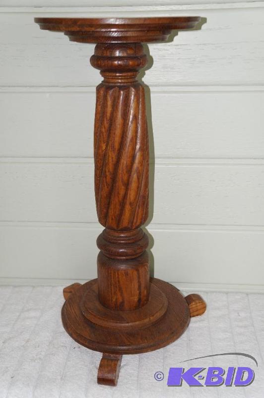 lot 61 image: Footed Wood Pedestal Plant Stand