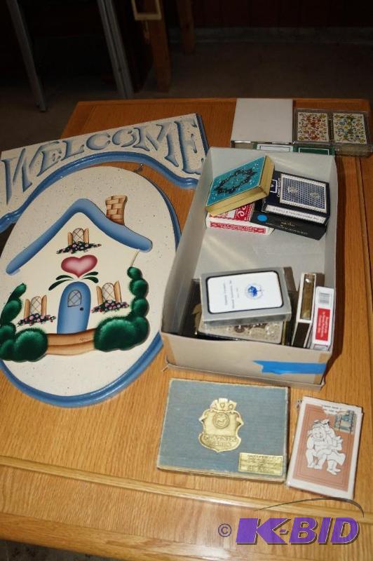 lot 2 image: Welcome Sign and a box of Playing Cards