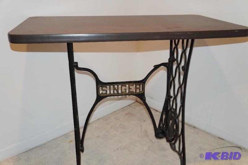 lot 69 image: Antique  Vintage Singer Sewing Machine Base Attached to Table Top
