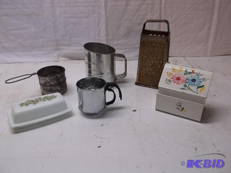 Lot with kitchen item butter dish,sifters,gra...
