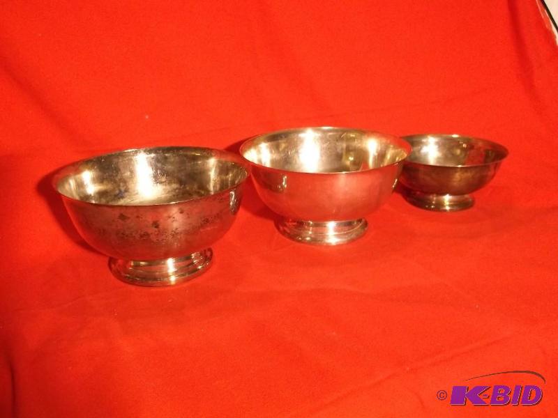 3 Large silver serving dishes....