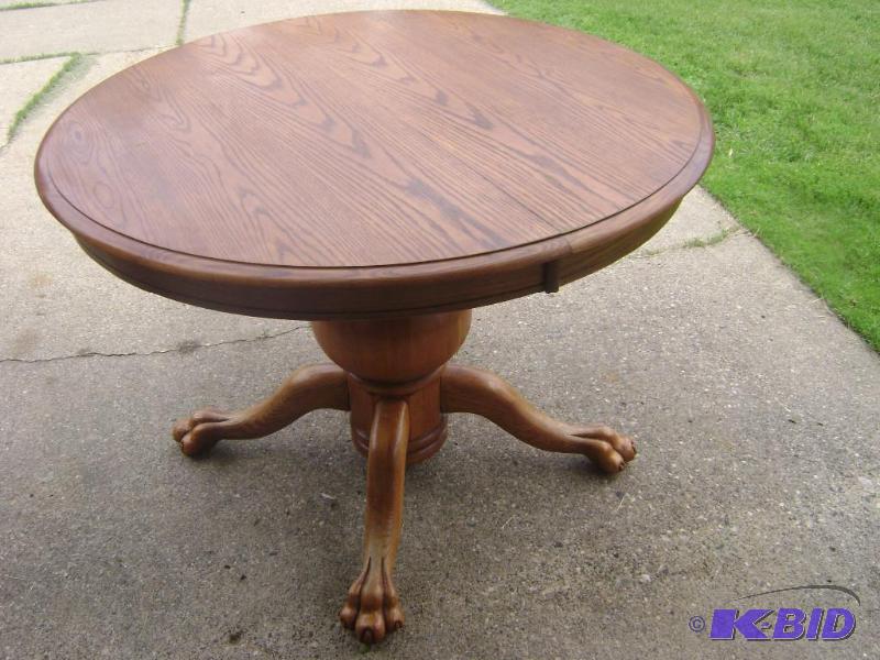 Beautiful Solid Oak Claw Foot Table measuring...