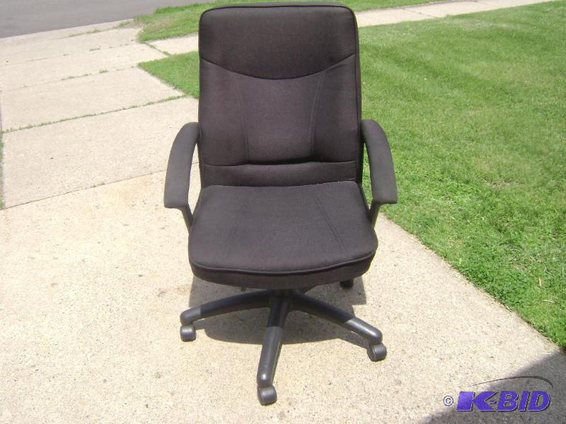 Black cloth office chair has seat adjustment ...