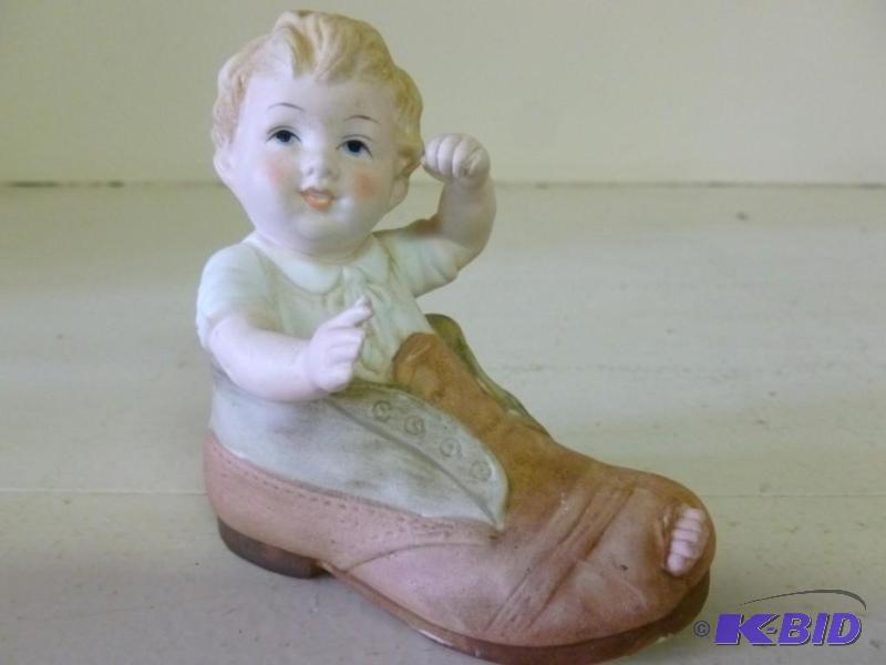 lot 150 image: Beautiful Lefton boy in shoe figuri...