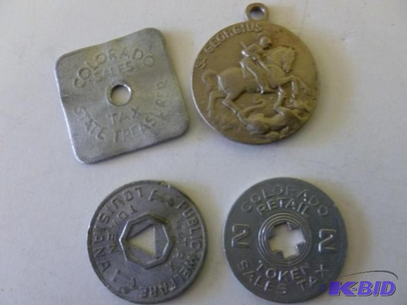 lot 214 image: Lot of four collectible metal token...