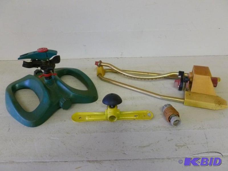 lot 229 image: Lot of three lawn sprinklers and a ...