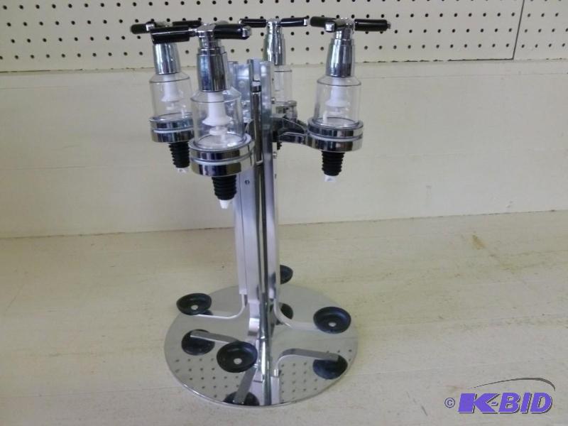 lot 27 image: Large four head drink mixer, comes ...