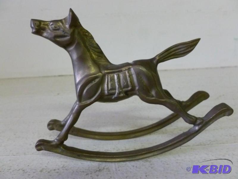 lot 48 image: Vintage cast brass rocking horse sh...