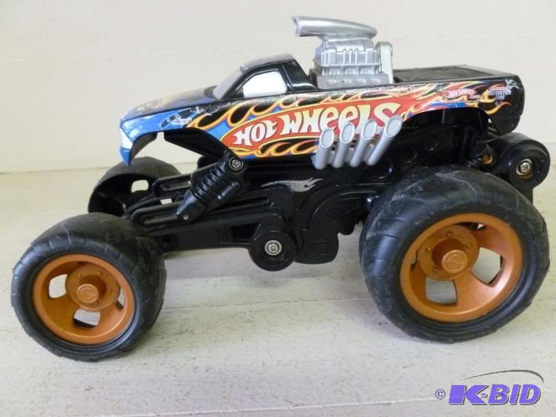lot 55 image: Large Hot Wheels monster truck meas...