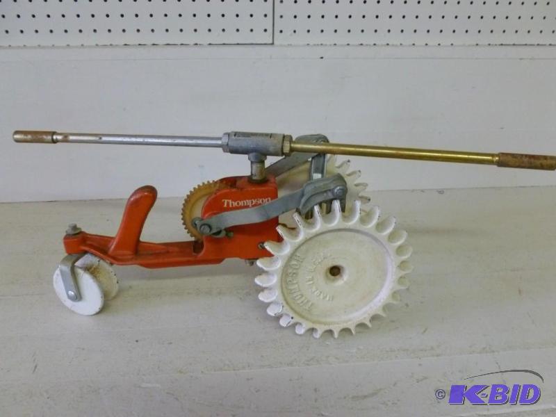 lot 8 image: Large Vintage Thompson cast metal t...