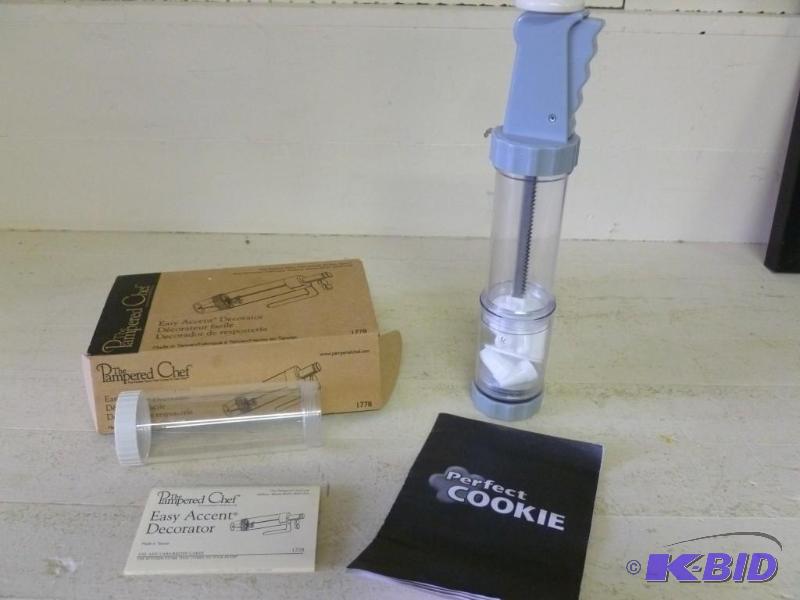 lot 94 image: This lot consists of a cookie press...