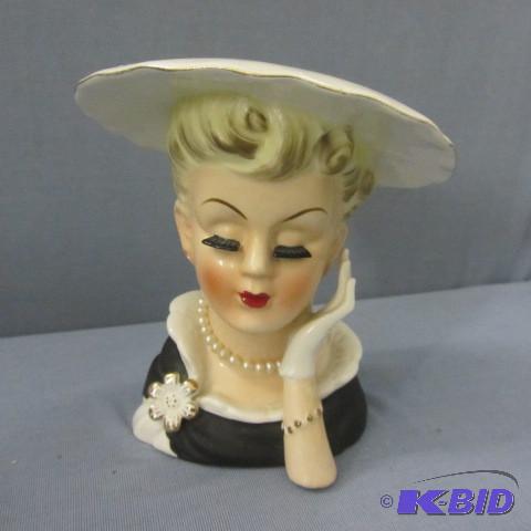 lot 22 image: Head Vase