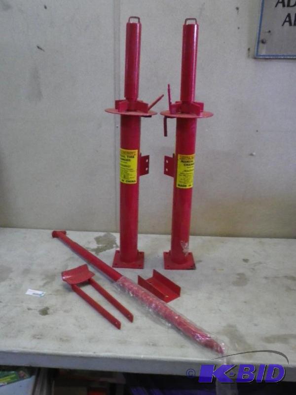 2 manual tire changers...