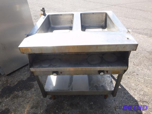 lot 16 image: 2 Bat Steam Table On legs, 220 sing...