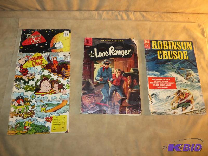 lot 31 image: Comic Books - (2) Treasure Chest) (1) Lone Ranger (1) Robinson Crusoe