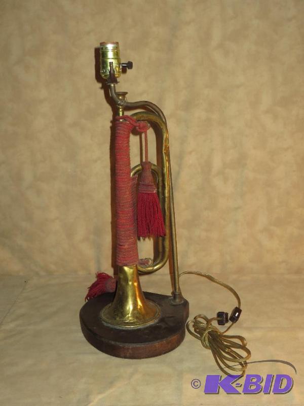 lot 93 image: VINTAGE OLD BUGLE LAMP with RED CORDSASH
