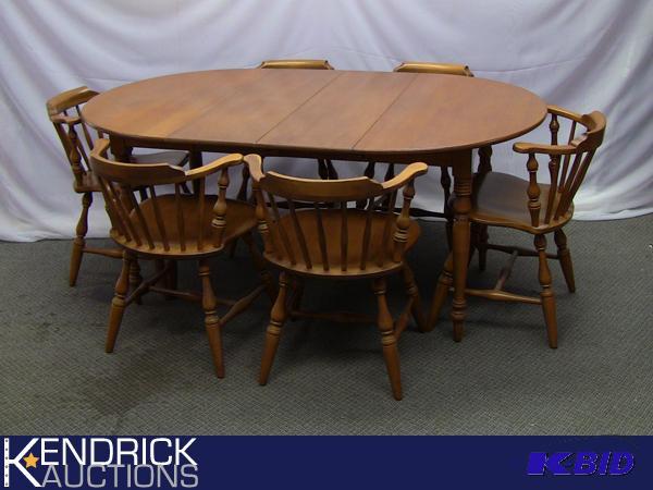 lot 1 image: Mint Condition Mid Century Conant Ball Maple Table with 6 Chairs, and Protective Cover Pad