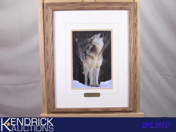 lot 104 image: Wood Framed Picture Howling Grey Wolf by Art Wolfe