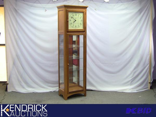 lot 8 image: Mint Condition Ridgeway Wood Clock Lighted Curio Cabinet