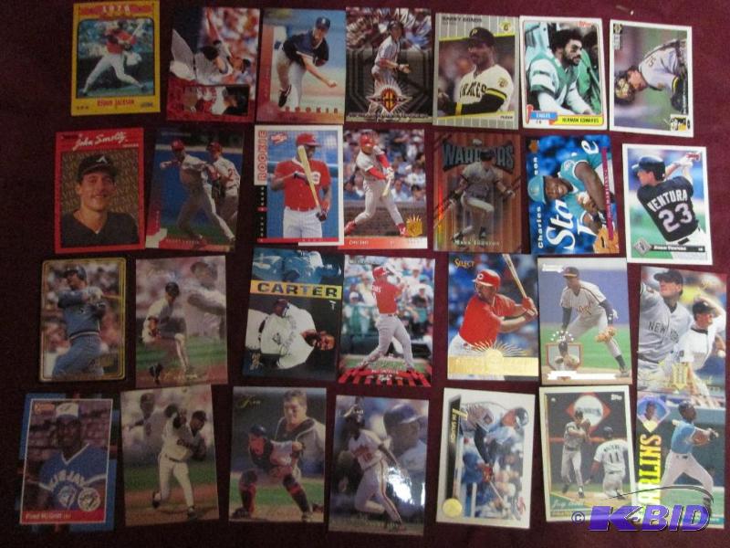 Lor of assorted sports cards with value...