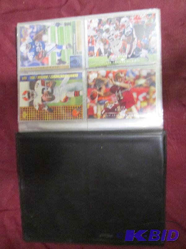 Album full of assorted football cards, see al...