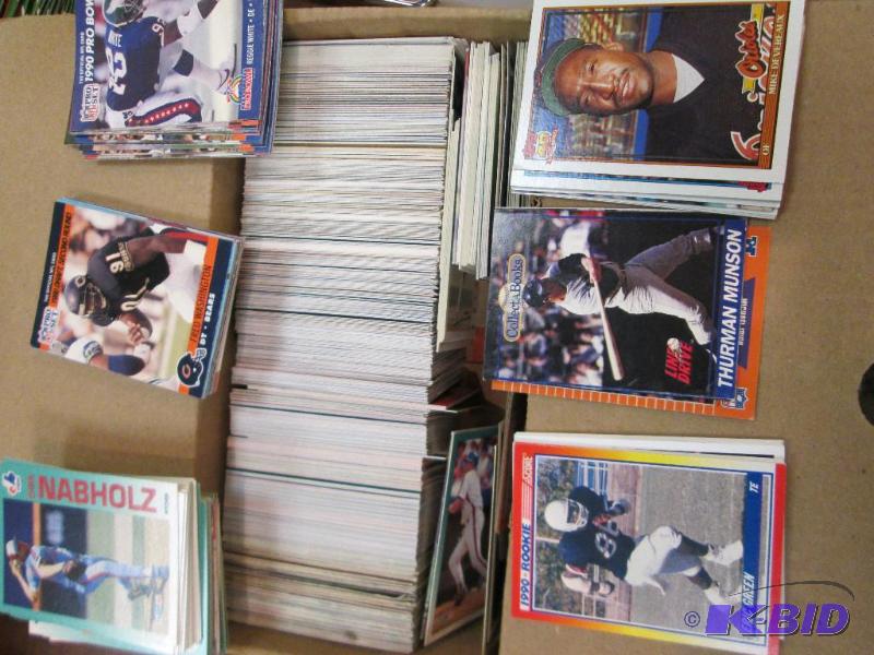 Box of assorted baseball and football cards...