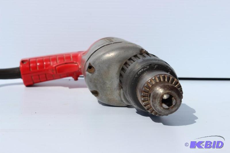 lot 23 image: Milwaukee Hammer Drill Heavy Duty Model # 539...