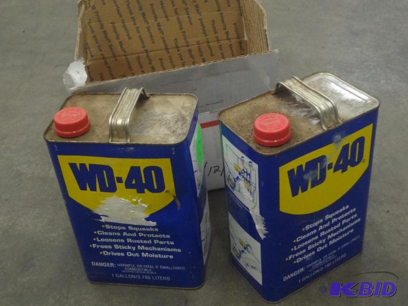lot 115 image: (2) Partial 1-Gallon Jugs Of WD-40...