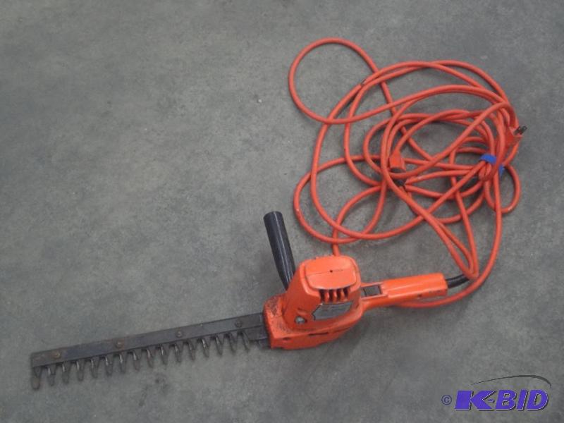 lot 43 image: Black & Decker 13" Electric Hedge Tr...