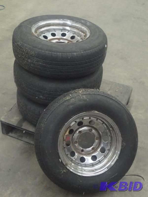 lot 74 image: (4) 6-Lug Rims With P2057514 Tires, Used...