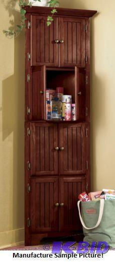 lot 31 image: Eight Door Walnut Finish Corner Pantry Cabine...