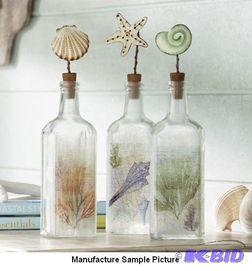 lot 93 image: Burton Coastal Glass Bottles - Set of 3 -&nbs...