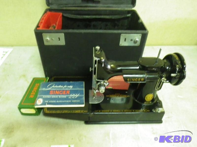 Singer model 221 portable sewing machine, exc...