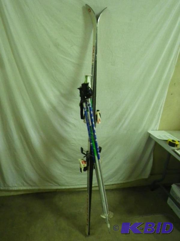 skis and 2 sets of poles...