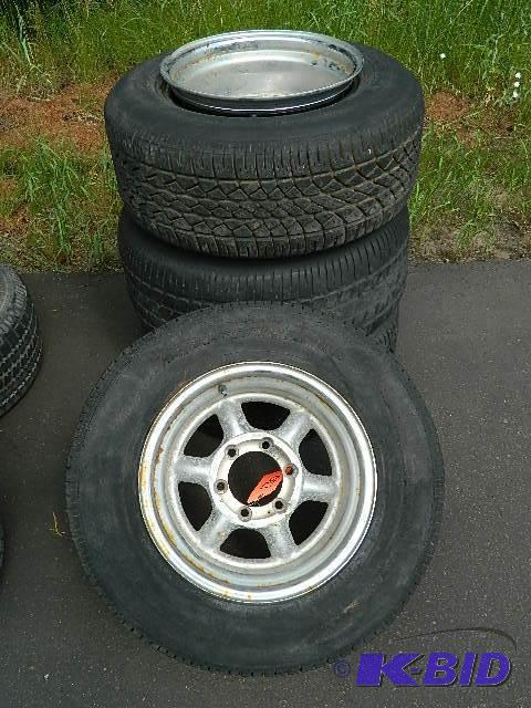 lot 130 image: Set of 4 Rims & Tires (One Rim is Bent) 1...