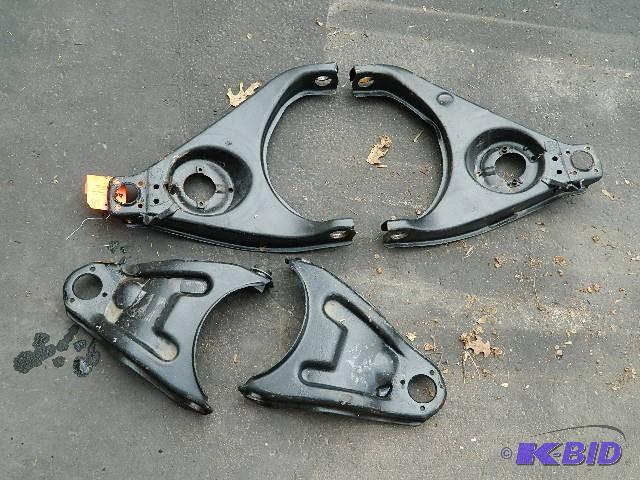 lot 14 image: 1955 Chevrolet A-arm brackets. Please see pic...