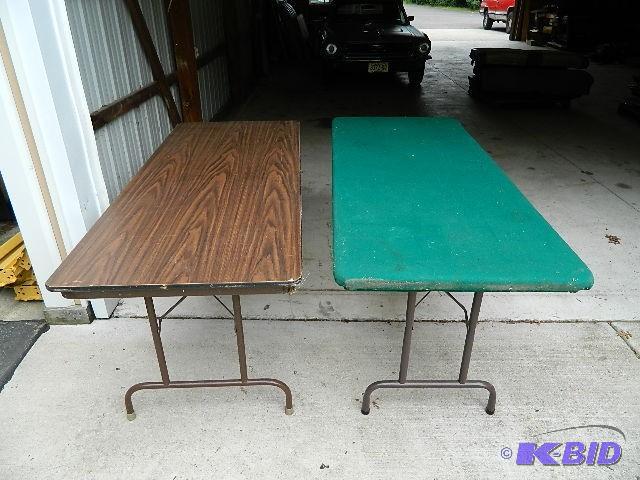 lot 193 image: 6 ft. folding tables (2). Please see pictures...