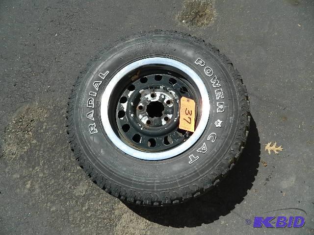 lot 37 image: (1) Power Cat Radial All Terrain Tire. 30 X 9...